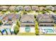 Aerial view of a home with a backyard oasis, featuring a pool and an outdoor kitchen at 11689 Hampstead St, Windermere, FL 34786