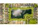 Overhead aerial view of a beautiful neighborhood pond at 11689 Hampstead St, Windermere, FL 34786