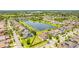 An aerial shot showcasing the neighborhood pond at 11689 Hampstead St, Windermere, FL 34786