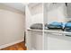 Well-organized walk-in closet with built-in shelving and hanging rods for optimal storage at 11689 Hampstead St, Windermere, FL 34786