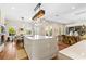 Open concept kitchen features a center island, breakfast bar, and dining area at 11689 Hampstead St, Windermere, FL 34786