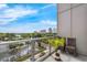 Relax on this cozy balcony with glass railings and enjoy the scenic city views at 150 E Robinson St # 409, Orlando, FL 32801