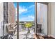 Balcony featuring seating and a view of the city and lake beyond at 150 E Robinson St # 409, Orlando, FL 32801