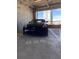Reserved parking spot in a secure garage with a sleek black sports car at 150 E Robinson St # 409, Orlando, FL 32801