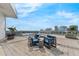 Rooftop patio boasts comfortable lounge furniture and panoramic city views at 150 E Robinson St # 409, Orlando, FL 32801