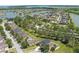 Real estate showing the home and a residential area, emphasizing its prime positioning near lakes and community parks at 1920 Commander Way, Kissimmee, FL 34746