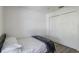 Bedroom featuring carpet, a closet with sliding doors, and natural light at 1920 Commander Way, Kissimmee, FL 34746