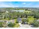 Beautiful single-Gathering home on a landscaped lot with mature trees and a view of the lake in a tranquil neighborhood at 1920 Commander Way, Kissimmee, FL 34746