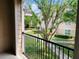 Enjoy the view from this cozy patio overlooking the well-maintained community grounds at 1980 Erving Cir # 107, Ocoee, FL 34761