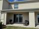 Covered patio with a sliding glass door that offers outdoor seating and relaxation space at 2232 Tay Wes Dr, St Cloud, FL 34771