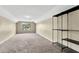 Bonus room featuring neutral walls, carpet floors and a large window at 2425 Rambling Oaks Way, Kissimmee, FL 34746