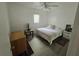 Simple bedroom with a cozy bed, natural light, and practical furnishings at 247 S Marydell Ave, Deland, FL 32720