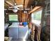 Functional laundry room with washer, dryer, and ample space for storage at 247 S Marydell Ave, Deland, FL 32720