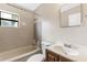 Bathroom featuring a shower and tub combination, single sink, and medicine cabinet at 2827 Sanka Dr, Orlando, FL 32826