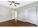 Bright bedroom with wood flooring and closet at 2827 Sanka Dr, Orlando, FL 32826