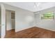 Bedroom boasts wood flooring and natural light at 2827 Sanka Dr, Orlando, FL 32826