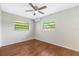 Bedroom boasts wood flooring and natural light at 2827 Sanka Dr, Orlando, FL 32826