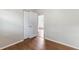 Bright bedroom featuring wood flooring and a closet at 2827 Sanka Dr, Orlando, FL 32826