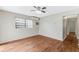 Bedroom features hardwood floors and natural light at 2827 Sanka Dr, Orlando, FL 32826