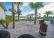Relaxing hammock area surrounded by palm trees, creating a peaceful oasis for residents at 3120 Paradox Cir # 101, Kissimmee, FL 34746