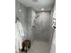 Modern bathroom features a spacious walk-in shower with rainfall showerhead and marble-like tile at 3131 Lowndes Dr, Winter Park, FL 32792