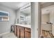 Bathroom boasts a granite countertop and a window at 3166 Rodrick Cir, Orlando, FL 32824