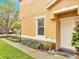 Attractive home exterior with manicured lawn, lush landscaping, and a welcoming front entrance at 3166 Rodrick Cir, Orlando, FL 32824
