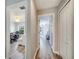 Hallway featuring two bedrooms and luxury vinyl flooring at 3166 Rodrick Cir, Orlando, FL 32824