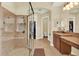 Large bathroom with glass shower, garden tub, dual sinks, and vanity area at 32613 View Haven Ln, Sorrento, FL 32776