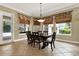 Dining room featuring a large table, modern chandelier, and lots of windows offering natural light at 32613 View Haven Ln, Sorrento, FL 32776