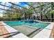 Capture the essence of relaxation with this stunning pool featuring a tranquil waterfall and inviting blue tile at 32613 View Haven Ln, Sorrento, FL 32776
