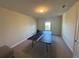 Bright bonus room with a ping pong table at 3399 Buoy Cir, Winter Garden, FL 34787