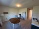 Office space featuring neutral walls, carpet and an oval shaped wooden table at 3399 Buoy Cir, Winter Garden, FL 34787