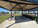 Shaded pavilion with picnic tables overlooks the neighborhood playground at 3399 Buoy Cir, Winter Garden, FL 34787