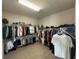 Spacious walk-in closet with ample hanging space and shelving at 3399 Buoy Cir, Winter Garden, FL 34787