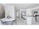 Well-lit dining area next to the kitchen features modern finishes and space for Gathering gatherings at 3527 Mayfair St, Kissimmee, FL 34758