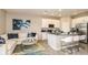 Open-concept kitchen and living area with modern appliances and stylish furnishings at 3527 Mayfair St, Kissimmee, FL 34758