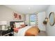 Tastefully decorated bedroom featuring a comfy bed, neutral colors, and side tables at 3535 Mayfair St, Kissimmee, FL 34758