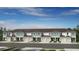 New townhomes showing the architecture, attached garages, and landscaping, located in a desirable community at 3535 Mayfair St, Kissimmee, FL 34758