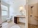 Accessible bathroom design includes vanity, toilet and shower with safety grab bars and ample space at 4729 Spindletree Ln, Orlando, FL 32829