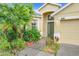 Inviting single-Gathering home with a lush, landscaped front yard, pathway to door, offering great curb appeal at 4729 Spindletree Ln, Orlando, FL 32829