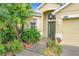 Inviting single-Gathering home with a lush, landscaped front yard, pathway to door, offering great curb appeal at 4729 Spindletree Ln, Orlando, FL 32829