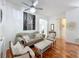 Chic living room with modern art, cozy furniture, and a bright, airy atmosphere at 4729 Spindletree Ln, Orlando, FL 32829