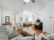 Inviting living room featuring hardwood floors, comfortable seating, and stylish décor at 4729 Spindletree Ln, Orlando, FL 32829