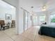 Bright main bedroom boasts abundant light, barn closet doors, and an adjacent sitting room at 4729 Spindletree Ln, Orlando, FL 32829