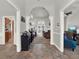 Spacious foyer with tile flooring leading to living and dining areas, showcasing an open layout at 4916 Winwood Way, Orlando, FL 32819