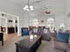 Spacious living room features neutral colors, plush seating, and an open floor plan at 4916 Winwood Way, Orlando, FL 32819