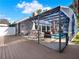 Relaxing screened pool area with an outdoor kitchen, dining space, and inviting pool at 4916 Winwood Way, Orlando, FL 32819
