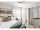 Bedroom featuring a ceiling fan, a window and a closet at 5005 Laguna Bay Cir # 17, Kissimmee, FL 34746