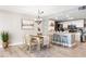Charming dining area with modern lighting open to kitchen at 5005 Laguna Bay Cir # 17, Kissimmee, FL 34746